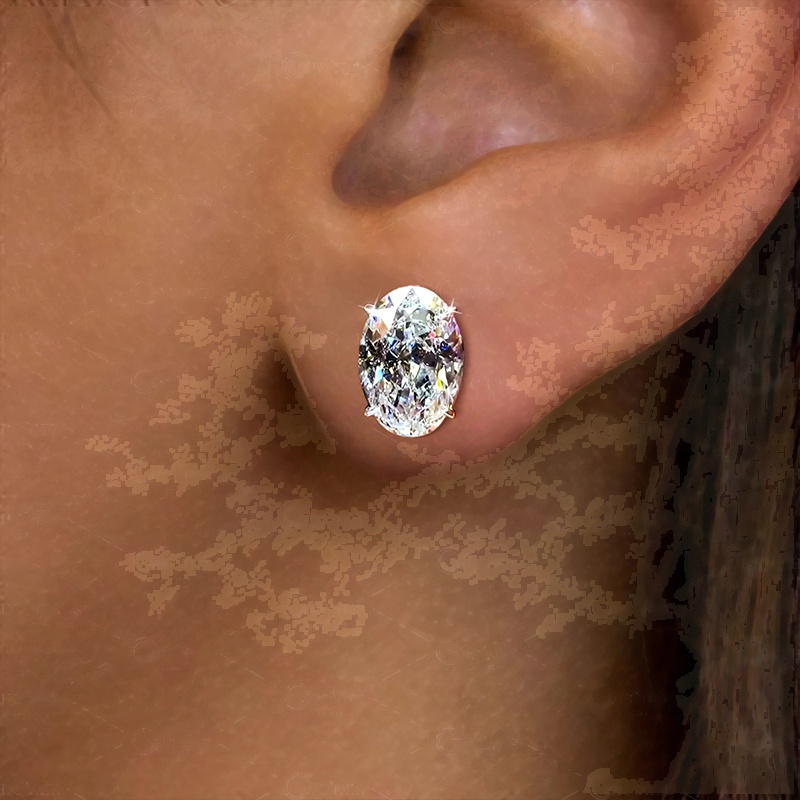 Oval Cut White Sapphire Stud Earrings